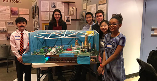 Group of Wilde Lake Middle School students with their future city project.