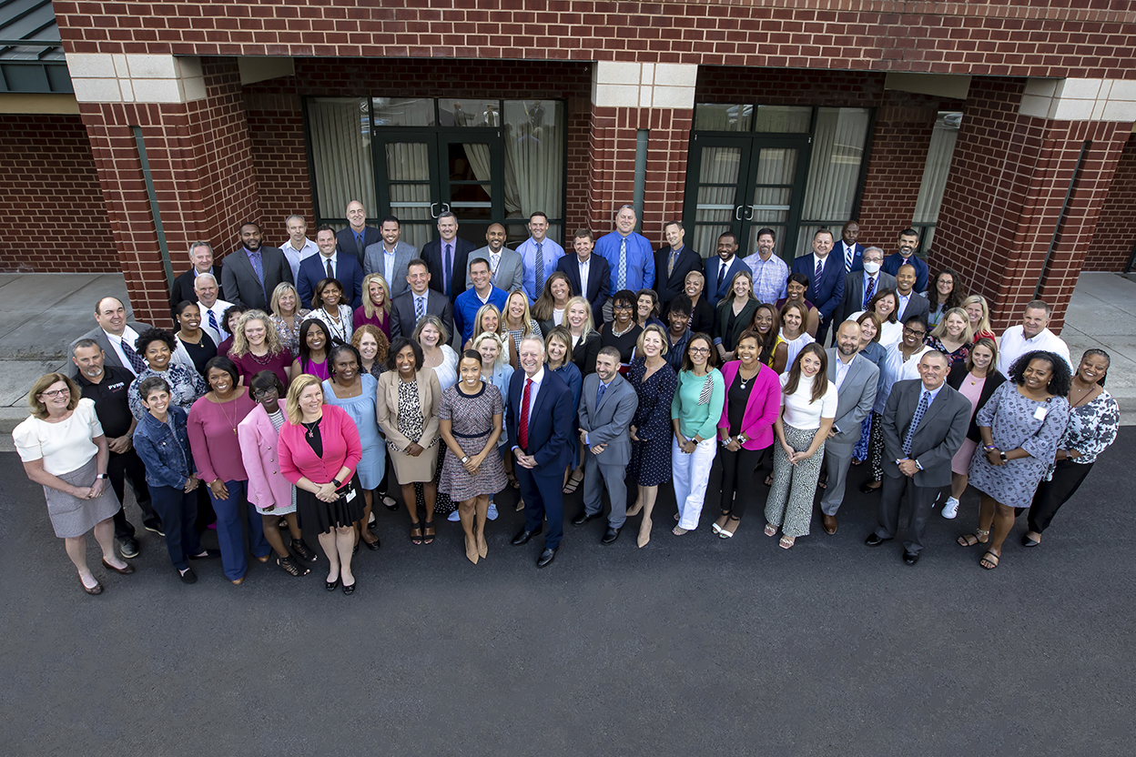 An aerial shot of Superintendent Dr. Michael Martirano standing will all the HCPSS principals.