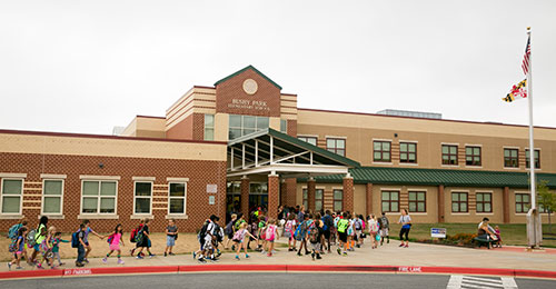 Students entering Bushey Park Elementary School
